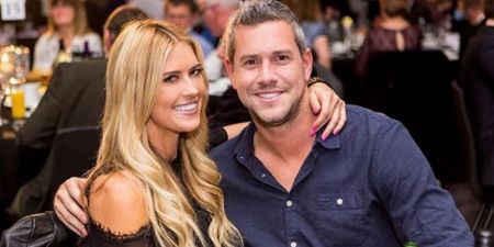 Christina and her present husband Ant Anstead holding each other by shoulder for photo